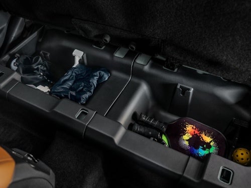 2024 Ford Maverick close up view of rear under-seat storage area