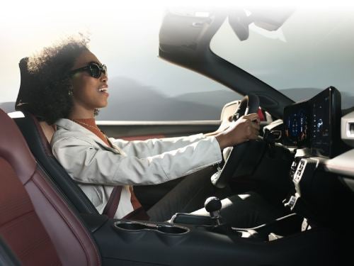 2024 Ford Mustang view of woman driving